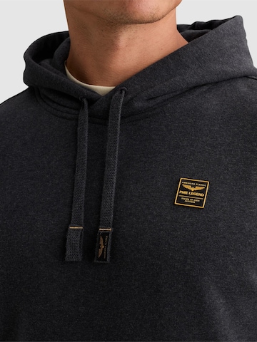 PME Legend Collegepaita 'Hoodie with rubber badge and kangaroo pocket' värissä sininen