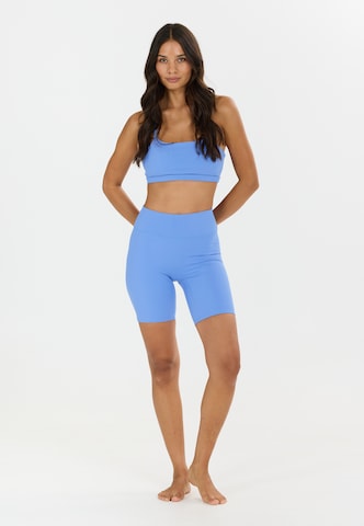 Athlecia Slim fit Sports trousers 'Blossom' in Blue