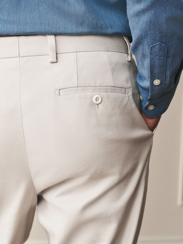 Regular Pantaloni cu dungă de la Next pe bej
