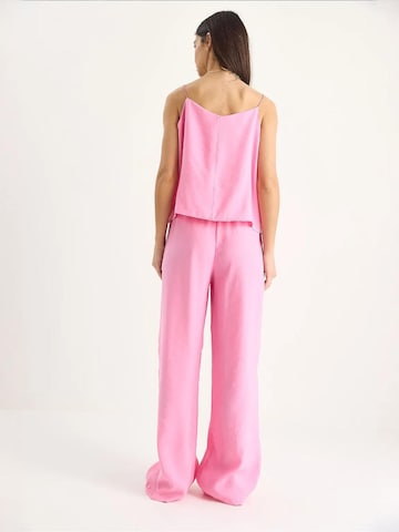 Completo pantalone di Bianco Lucci in rosa