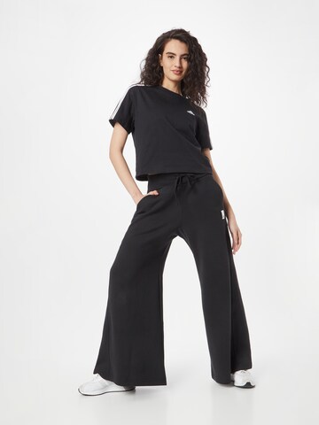 ADIDAS SPORTSWEAR Wide leg Παντελόνι φόρμας 'Lounge Fleece Wide' σε μαύρο