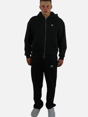 HEFTYKA Loosefit Sporthose 'OPEN LEG JOGGER'‌ in Schwarz