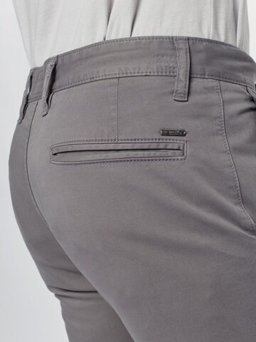 Slimfit Pantaloni chino 'Taber' di BOSS in grigio