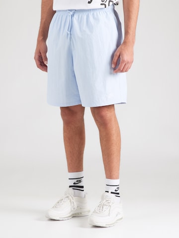 Nike Sportswear - Loosefit Calças 'CLUB' em azul: frente