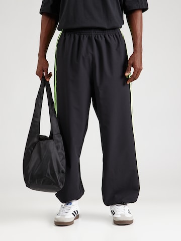 Effilé Pantalon ADIDAS ORIGINALS en noir : devant