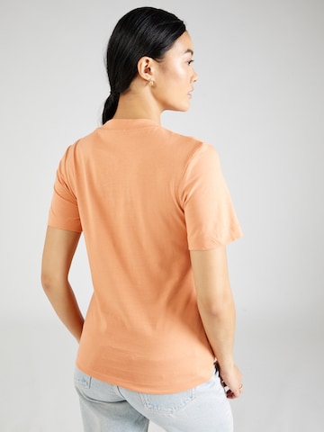 Maglietta di Calvin Klein Jeans in arancione