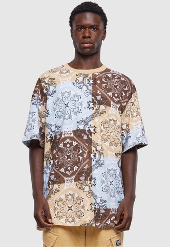 T-Shirt Karl Kani en beige : devant