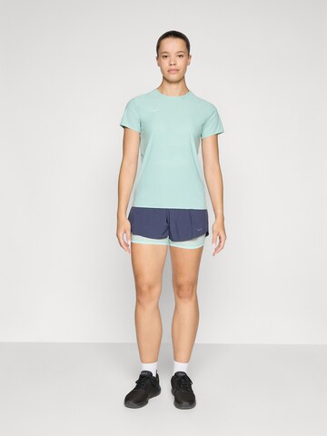 HOKA Funktionsbluse 'AIROLITE' i grøn
