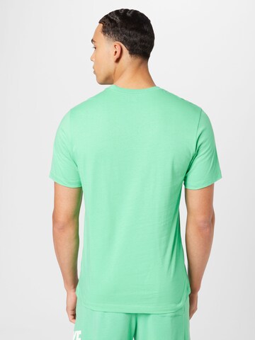 Nike Sportswear Regular Fit T-Shirt 'Swoosh' in Grün