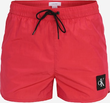 Calvin Klein Swimwear Board Shorts in Pink: front