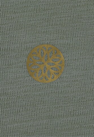 Athlecia Sports top 'Mota' in Green