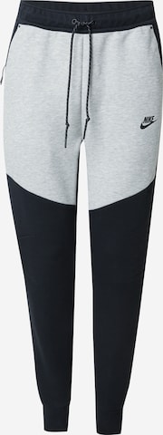 Pantalon 'TCH FLC' Nike Sportswear en noir : devant