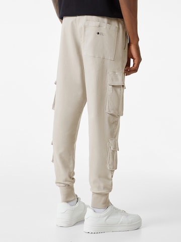 Bershka Regular Cargobroek in Beige