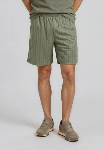 Loosefit Pantaloni di Karl Kani in verde: frontale
