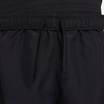 NIKE Regular Workout Pants in Black