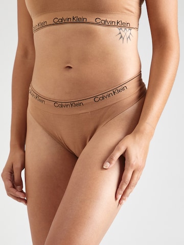 bēšs Calvin Klein Underwear Stringu biksītes: no priekšpuses