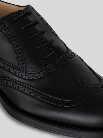 Scarpa stringata 'Brogue' di Solari Milano in nero
