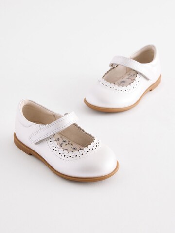 Next - Bailarina en blanco