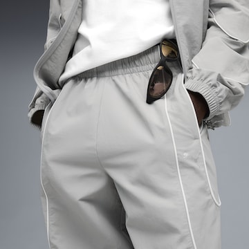 PUMA Loose fit Trousers in Grey