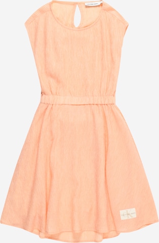 Calvin Klein Jeans Sukienka w kolorze pomarańczowy: przód