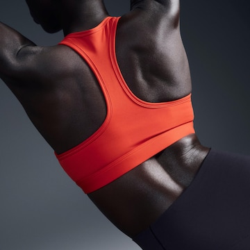 NIKE Bralette Sports bra 'Swoosh' in Red