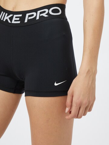 NIKE Skinny Sports trousers 'Pro' in Black