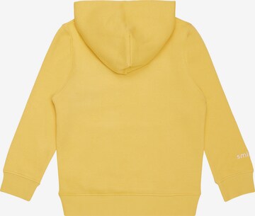 Sweat smiler. en jaune