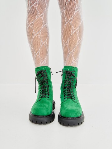 CESARE GASPARI - Botines con cordones en verde: frente