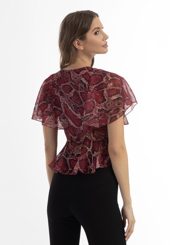 Camicia da donna di faina in rosso