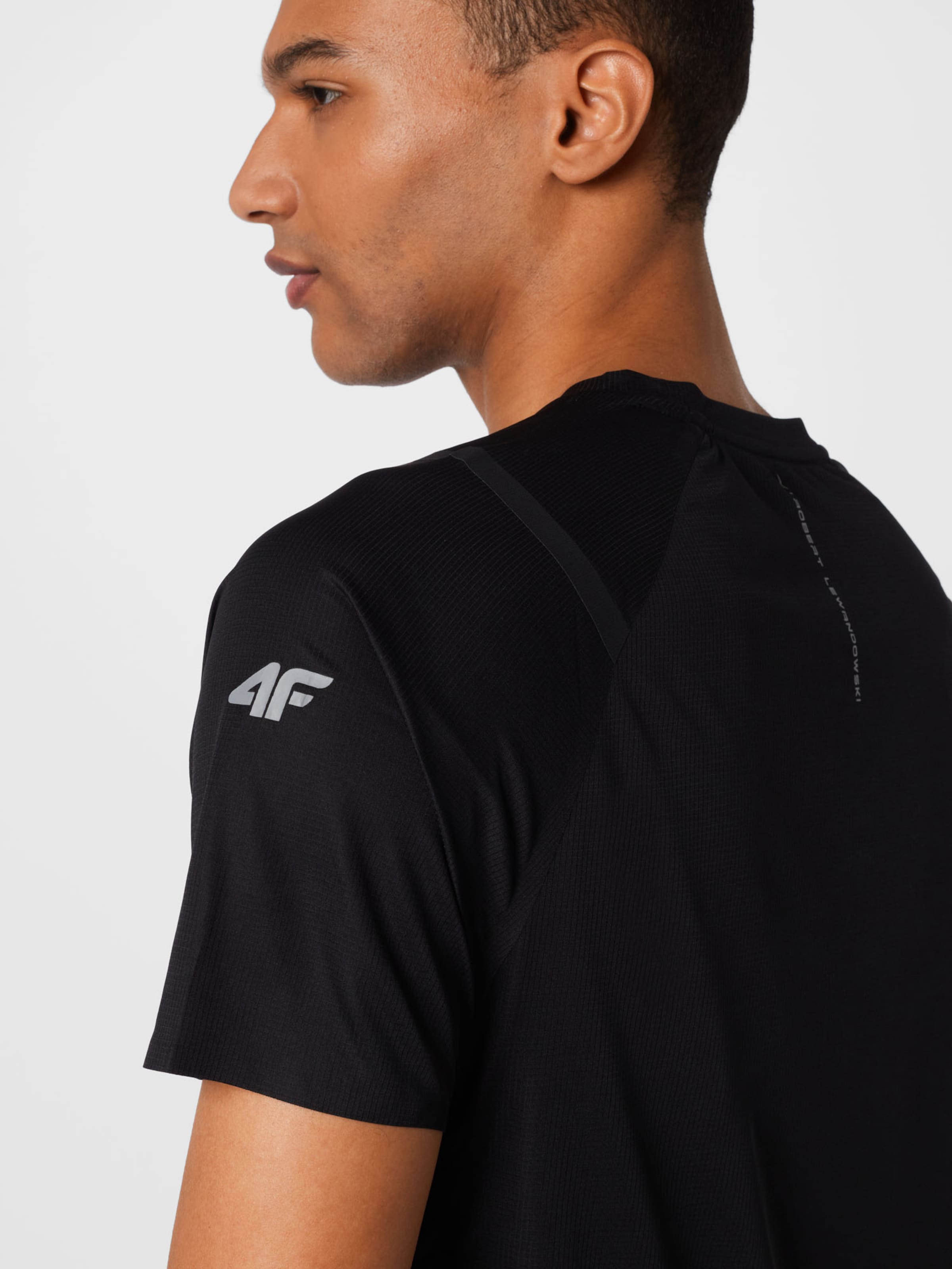 Sport T-Shirt fonctionnel 4F en Noir 