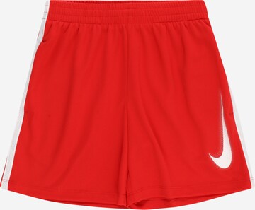 Loosefit Pantalon de sport NIKE en rouge : devant