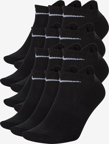 NIKE Athletic Socks in Black: front