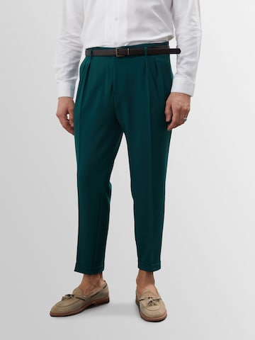 Antioch Tapered Pleat-front trousers in Green: front