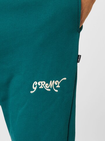 Tapered Pantaloni 'THE WESTBOUND' di Grimey in verde