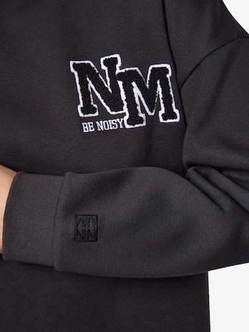 Noisy may - Sudadera 'NMBelieve' en negro