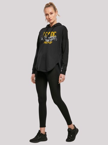 F4NT4STIC Sweatshirt 'ACDC Rock Band PWRUP Portrait Motion' in Zwart