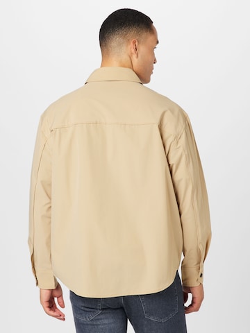 Calvin Klein Jeans Between-Season Jacket 'ESSENTIAL' in Beige