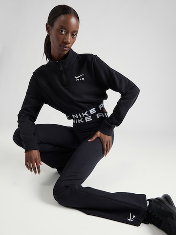 Nike SportswearFlared/zvonoliki kroj Tajice - crna boja