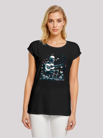 F4NT4STIC T-Shirt 'Skelett spielt Gitarre, Musik, Liebe' in Schwarz: Vorderseite