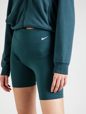 NIKESkinny Sportske hlače 'One' - zelena boja