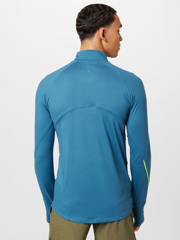 UNDER ARMOUR Функционална тениска 'Qualifier' в синьо
