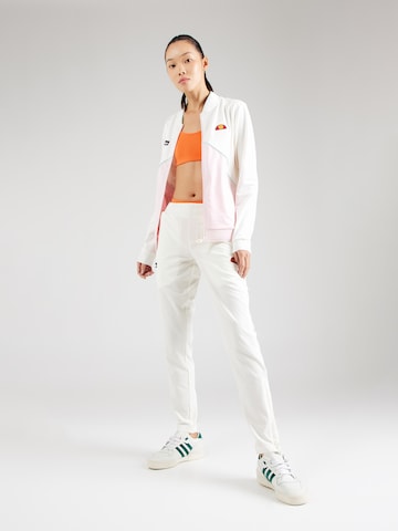 Coupe slim Pantalon ELLESSE en blanc