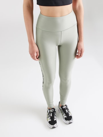 Skinny Pantaloni sportivi di UNDER ARMOUR in verde: frontale