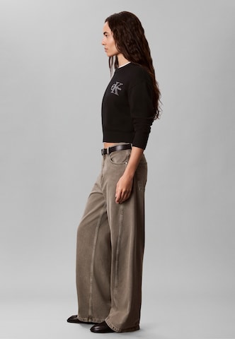 Calvin Klein Jeans - Pullover em preto: lateral