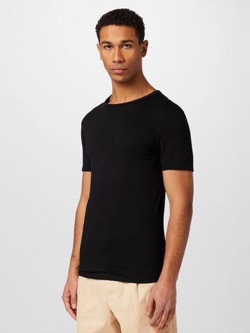 LACOSTE - Camiseta en negro: frente