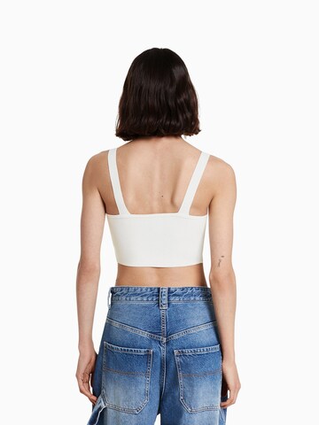 Corsete de la Bershka pe alb