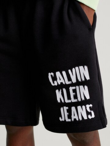 Calvin Klein Jeans Lużny krój Spodnie w kolorze czarny