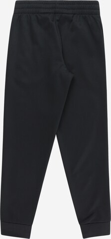 NIKE Tapered Sports trousers in Black