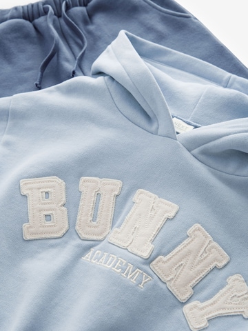 Set Next en bleu
