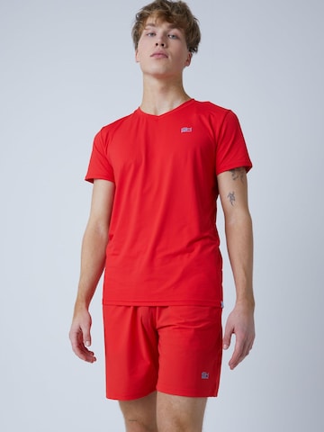 SPORTKIND - Pantalón deportivo 'Regular' en rojo